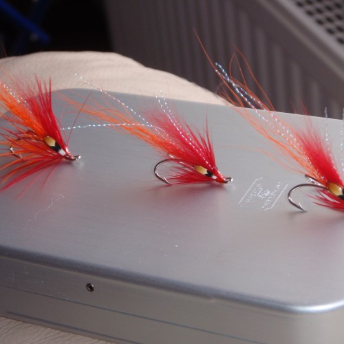 Here's my own Jock's Shrimp salmon fly tied in 3 different dressing densities. I'm not keen on the heavily dressed version to the left but the other 2 look about right with the middle fly for regular medium water level fishing and the right hand fly for lower water levels.