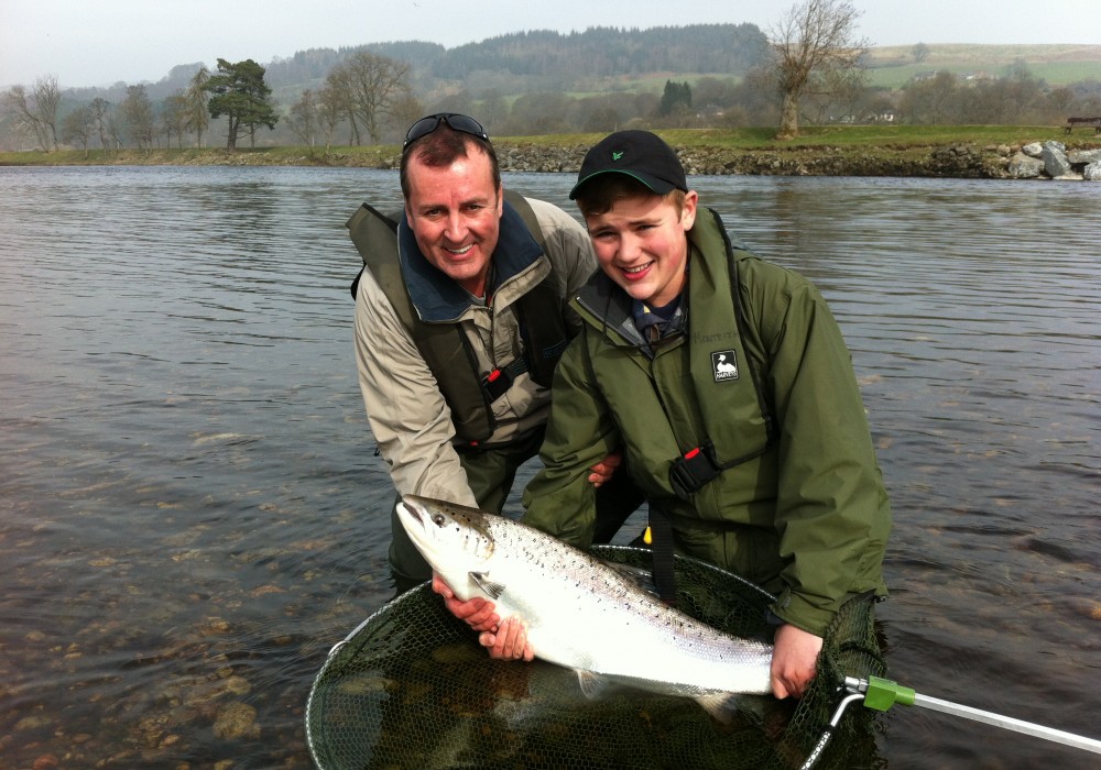 Here's the first heavyweight salmon for this young fisher seen here in the photograph with his amazed father! A few moments after this 20lbs Tay springer was released he hooked and landed another perfect fish of similar proportions. A truly amazing morning on the River Tay during late March.