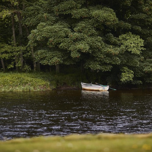 This small River Spey rowing boat is one of many such boats that are used on the River Spey to shuttle fishing guests across the river to the other riverbank. Sometimes they are also used as casting platforms for fishers who aren't comfortable wading in the river.