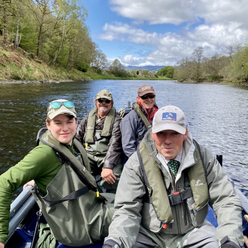 Here's a boat load of River Tay salmon fishing guests with their personal guide motoring up through the Channel Pool on the Upper Kinnaird Beat near Aberfeldy. You can see from the lack of full foliage on the riverbank trees that this shot was taken during mid May.