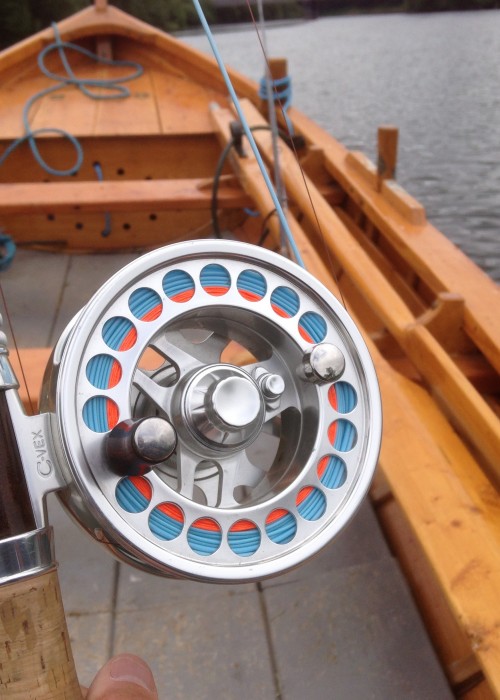 This beautiful salmon fly reel has been my own weapon of choice over the last 20+ years. The Van Staal C-Vex Combo 9/11 comes with 2 spools of different line capacity sizes yet both fit into the same reel housing. This is the 9/10 spool showing in this photograph which was taken in the traditional Tay salmon fishing 'coble' boat near Pitlochry in the Tay Valley.