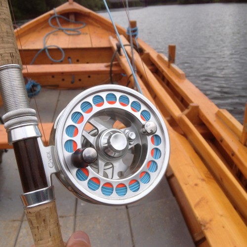 This beautiful salmon fly reel has been my own weapon of choice over the last 20+ years. The Van Staal C-Vex Combo 9/11 comes with 2 spools of different line capacity sizes yet both fit into the same reel housing. This is the 9/10 spool showing in this photograph which was taken in the traditional Tay salmon fishing 'coble' boat near Pitlochry in the Tay Valley.