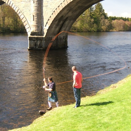 Here's 'Graham Of Menteith' kilted Jock Monteith out teaching the traditional Spey cast underneath the Tay's Telford Bridge at Dunkeld. Look at the perfect D-Loop rod loading perfection.