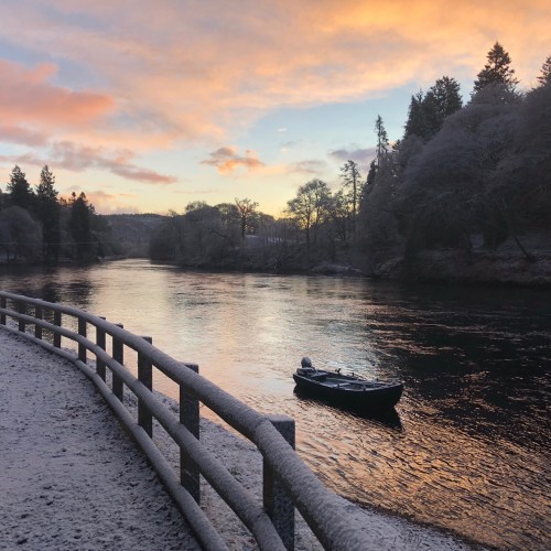 Here's a cold early morning River Tay shot from Dunkeld showing frozen snow covered riverbanks, salmon fishing boat and riverside fence in January. The sun soon melted most of what you see when it rose above the tree line on the far bank of the Tay,